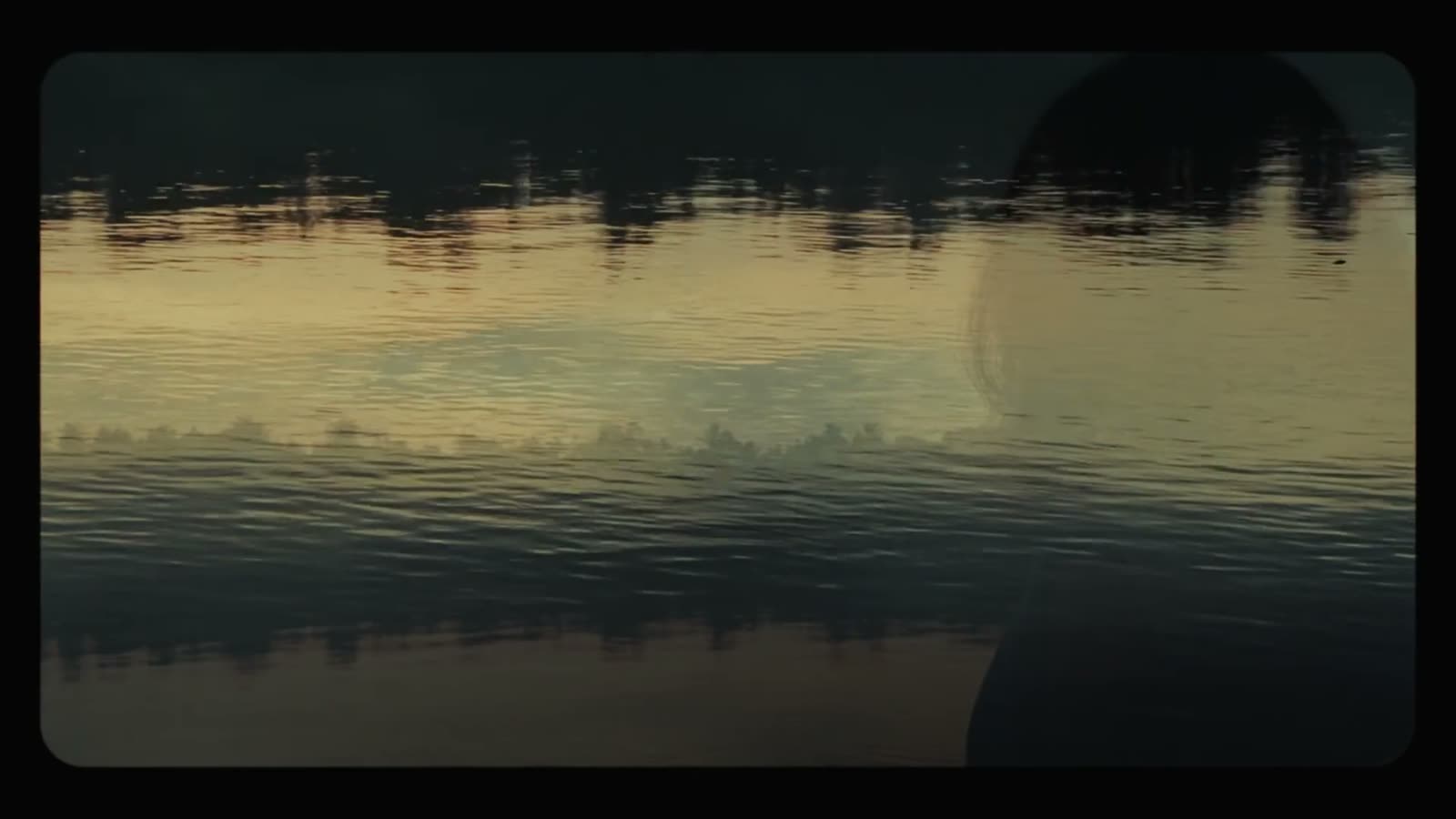 Sunset reflected on still water